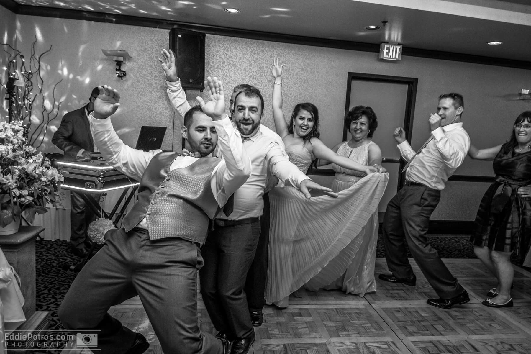 DJ Eddie11 at a wedding with people dancing